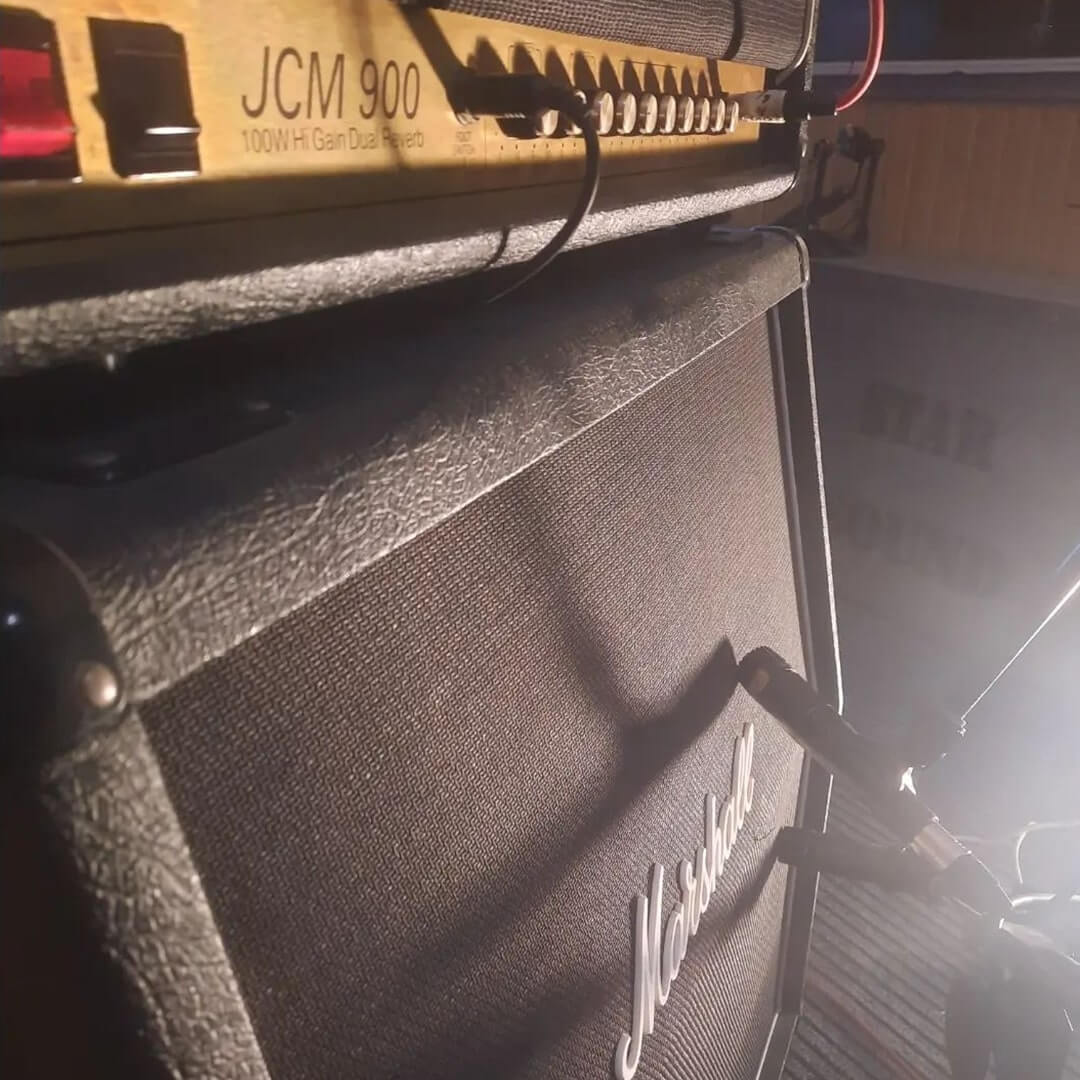 an image inside a room of studio showing a speaker